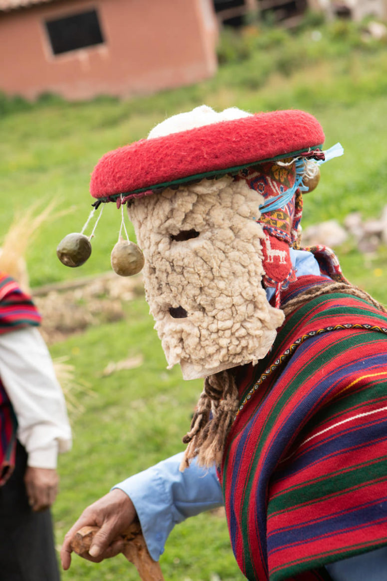 Peruvian man dancing in traditional clothing