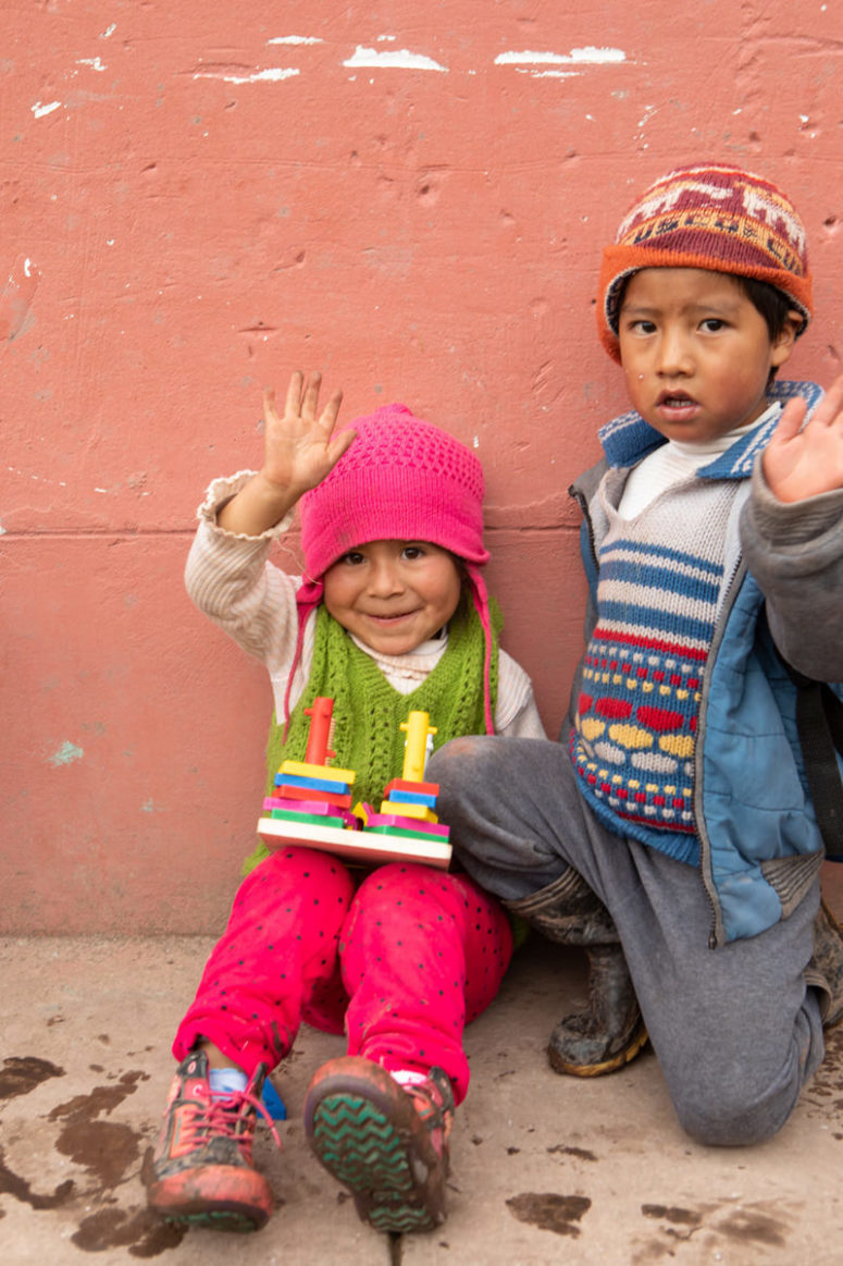 School children wave good morning near Cusco.