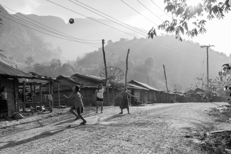 travel photography kids playing laos