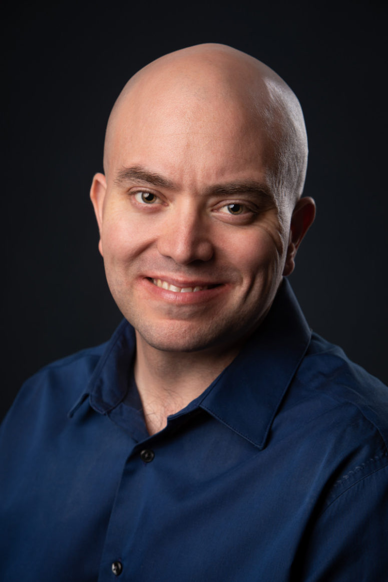 headshot photography man on black background