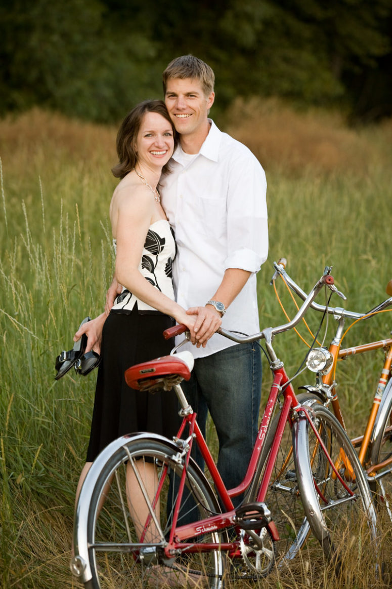 engagement photographer couple with cruiser bikes
