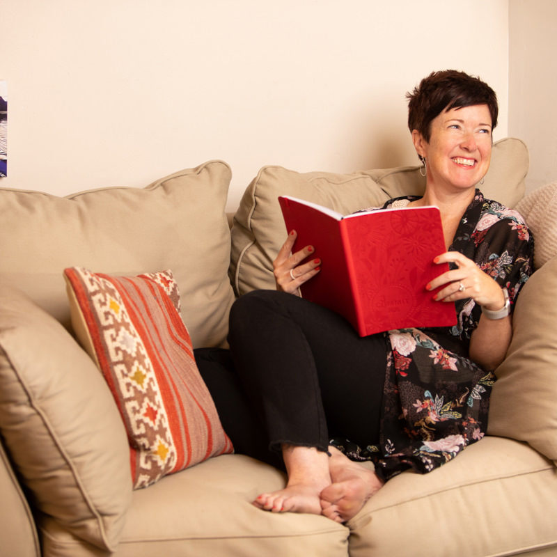 personal brand photograph of woman in chair