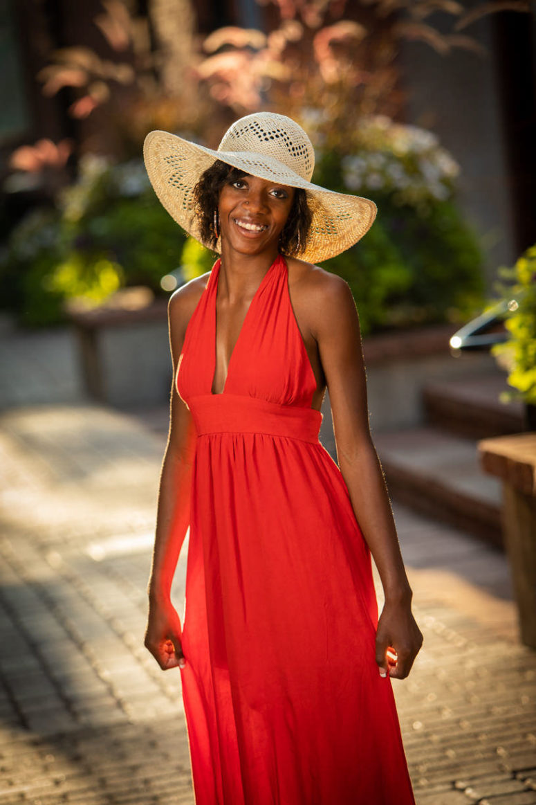 girl in red dress in old town fort collins