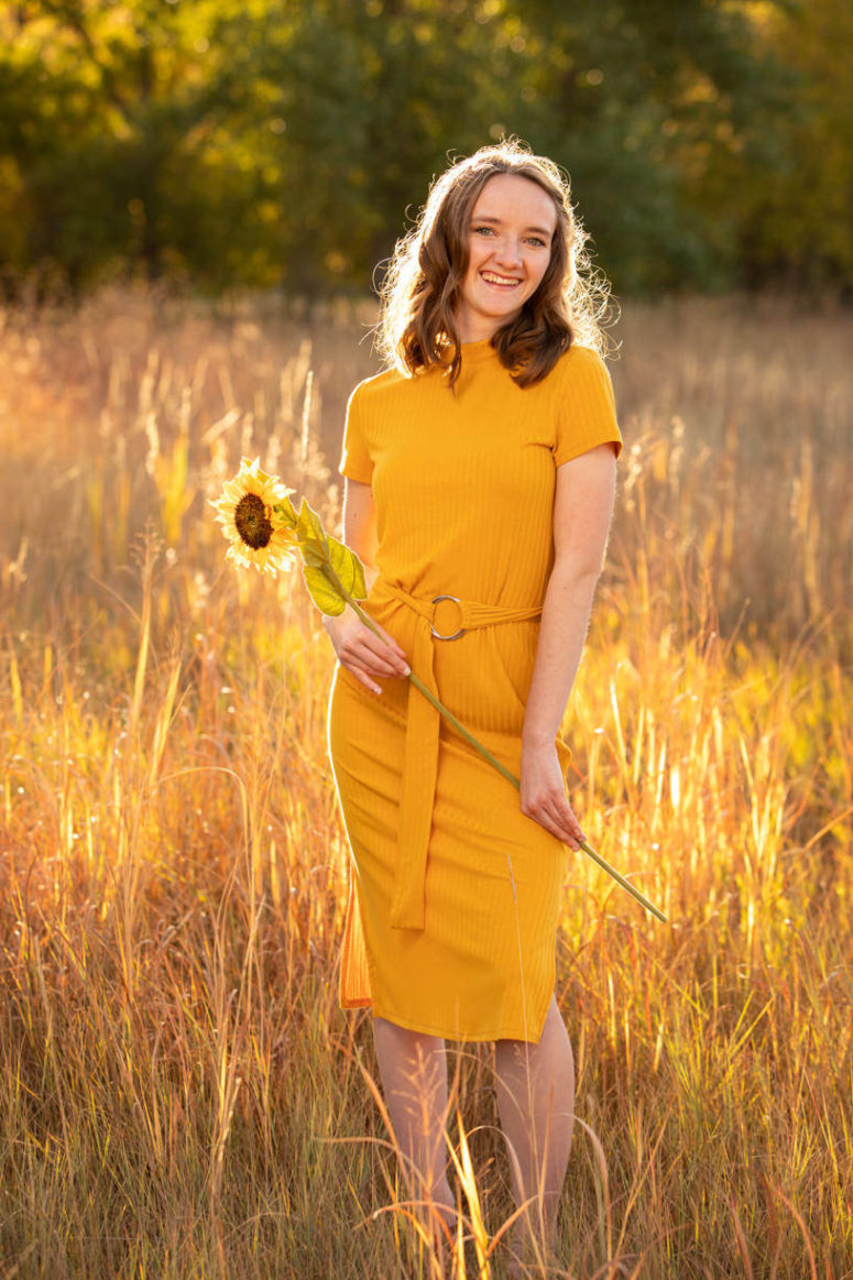 senior photograph with sunflower